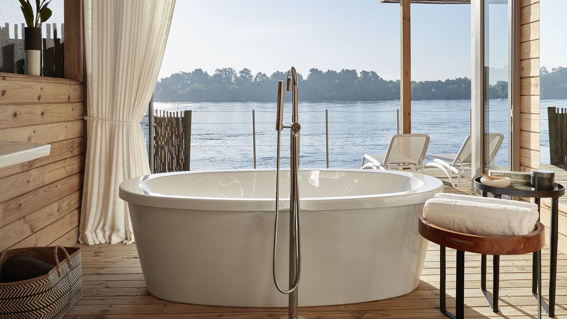 Victoria Falls River Lodge Island Treehouse ensuite bathroom with river view
