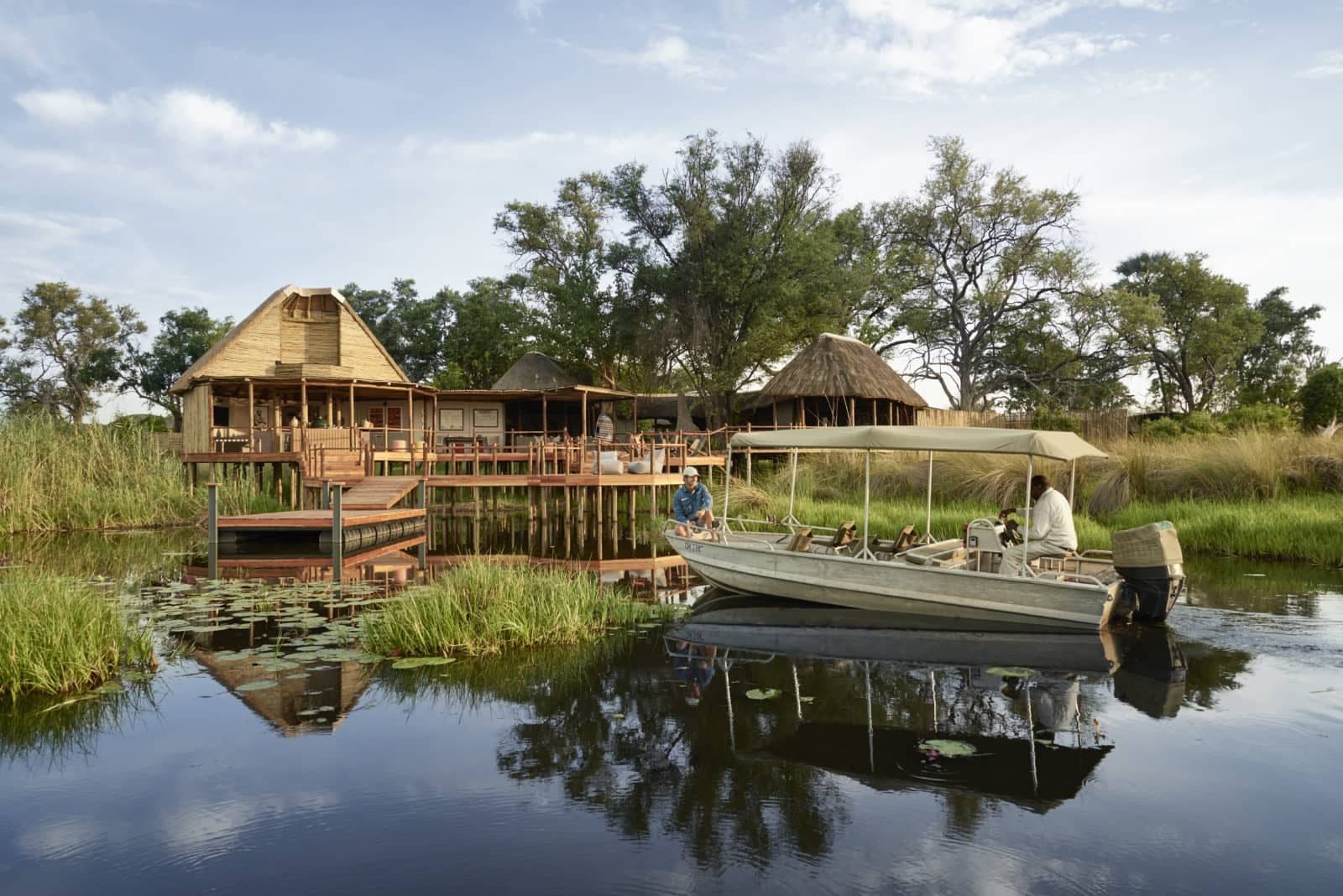 Sanctuary Baines Camp Boating Okavango scaled (1)